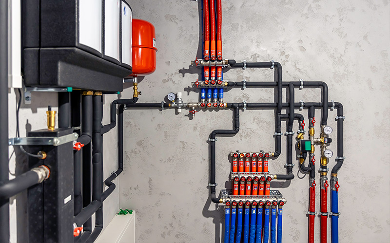 Intricate residential water manifold system with shut-off valves